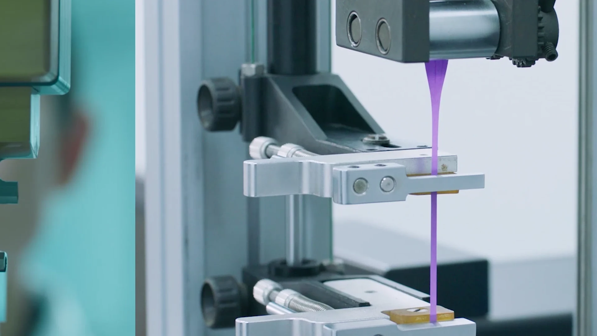 A material strip held in evaluation equipment at a manufacturing partner facility